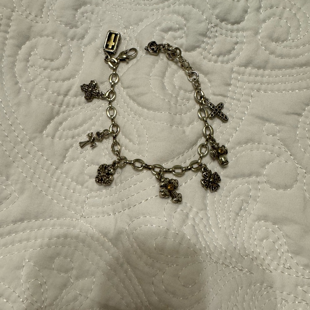 Eternity Crosses bracelet by Brighton jewelry. 8 unique charms, about 8 1/2”.